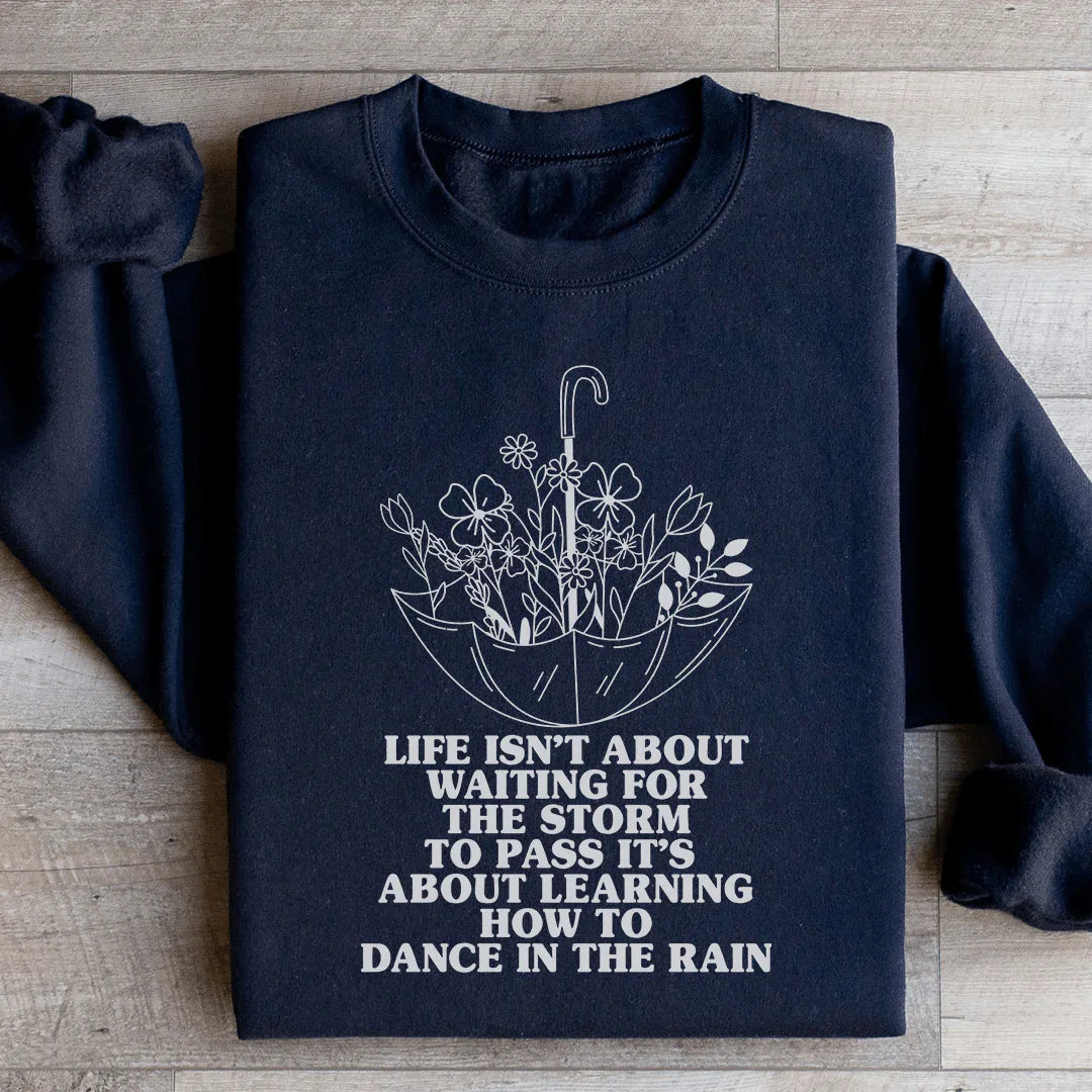 Inspirational Resilience Graphic Sweatshirt – "Life Isn't About Waiting For The Storm To Pass It's About Learning How To Dance In The Rain"